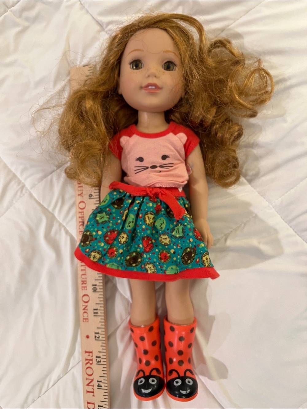 Willa Wellie Wisher Pink Tee with Teal Floral Skirt and Red ladybug boots.